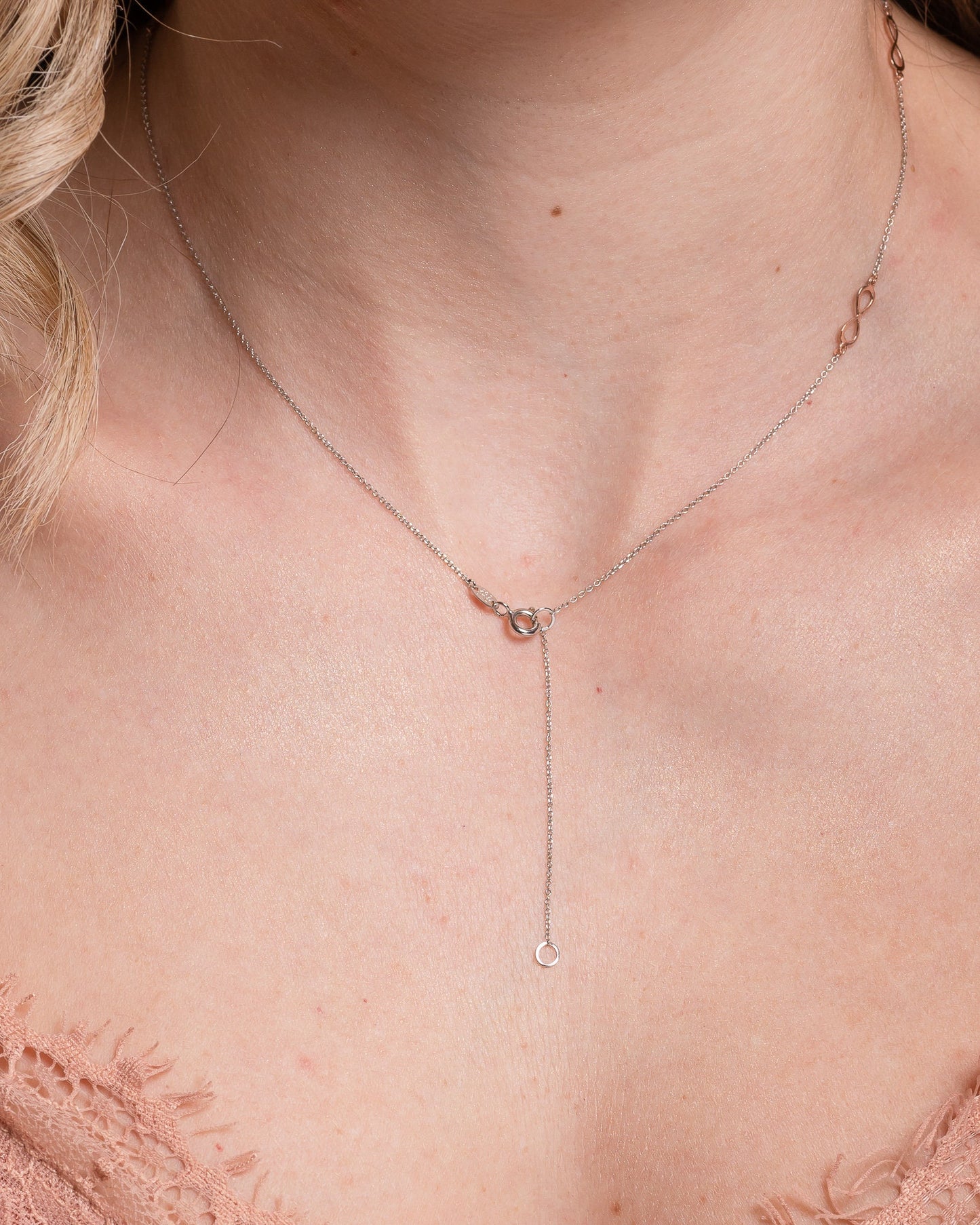 14k gold spring ring clasp for a necklace with a 5cm extender worn by a model