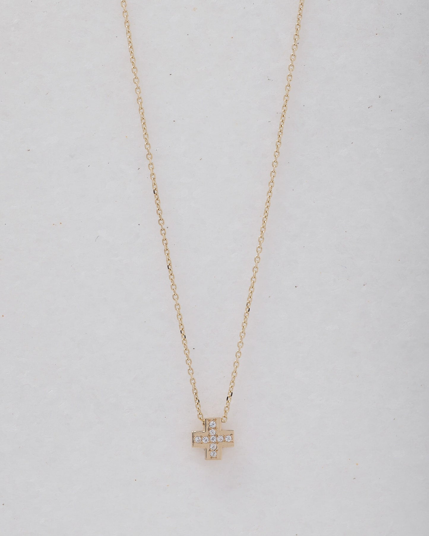 paved small cross necklace in 14k yellow gold for women