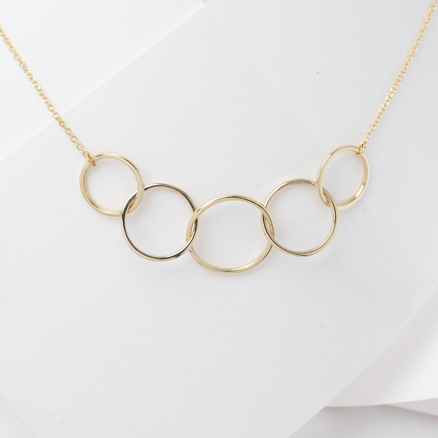 14k gold necklace with five interlocking circles for women
