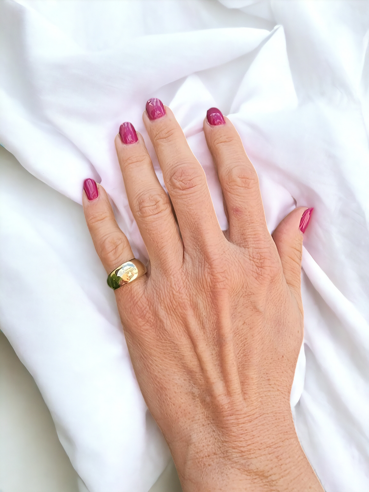 A thick 9mm dome ring crafted in 14k solid gold for women.