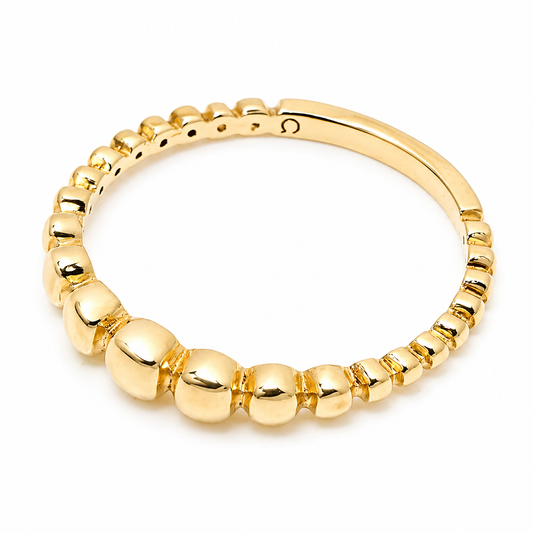 14k Gold beaded ring on a white background