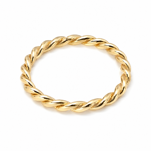 14k Gold twisted ring on a white background