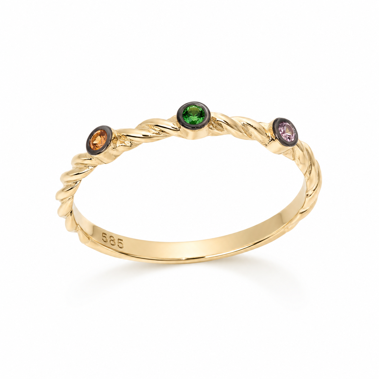 14K Gold ring with three colored gemstones on a white background