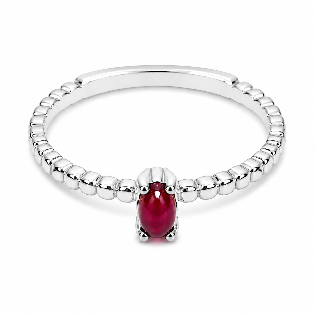 14k white Gold beaded ring with ruby on a white background