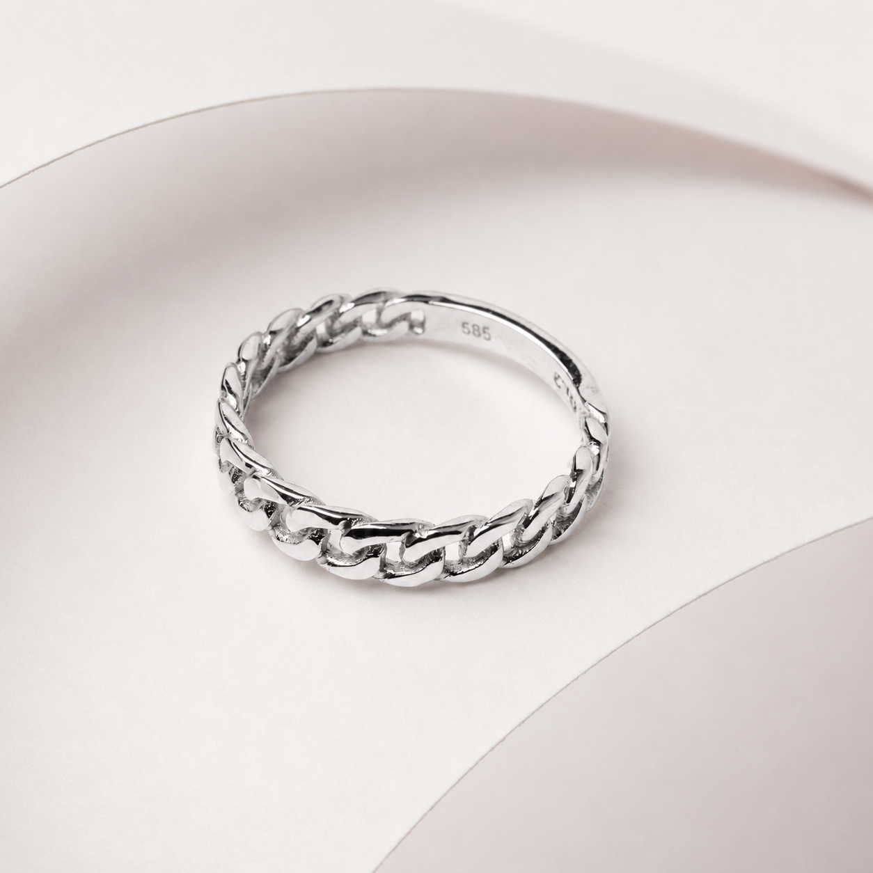 14k white Gold chain ring on a white background
