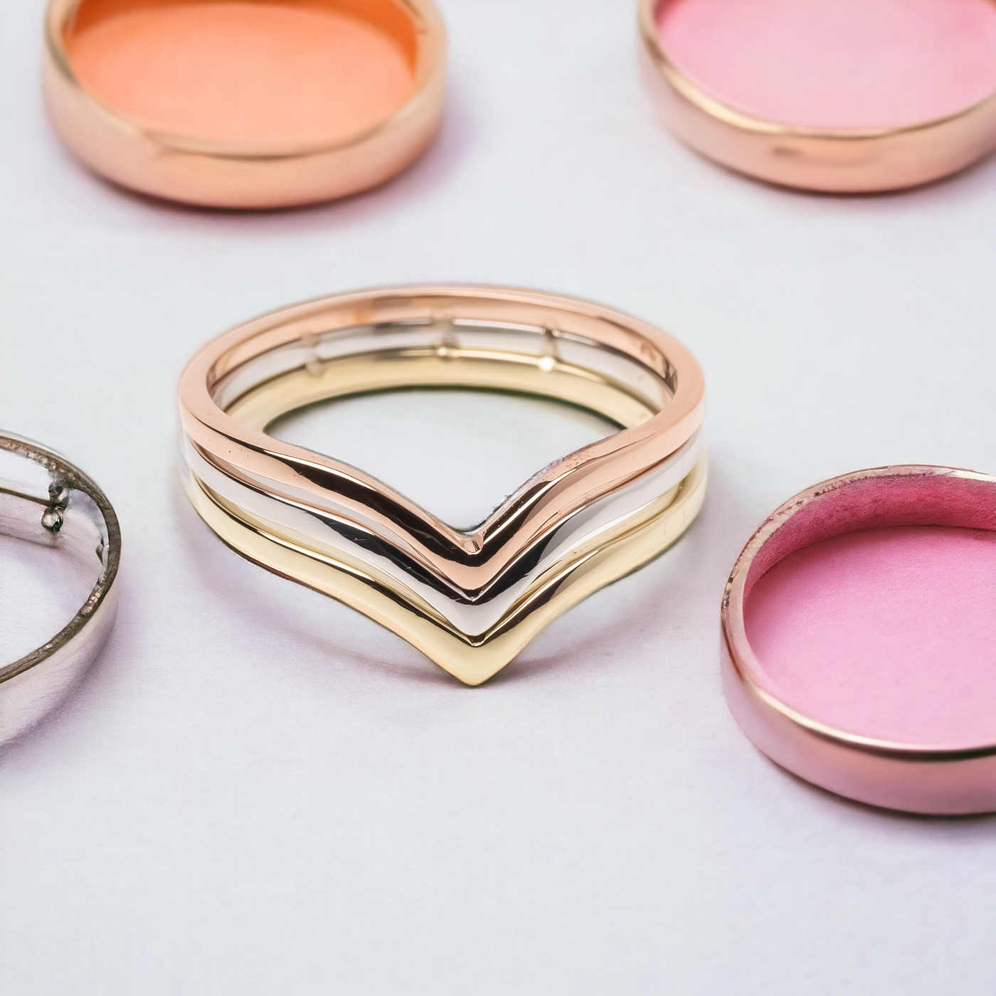 Handmade tri-tone triple chevron ring in 14k gold for women.