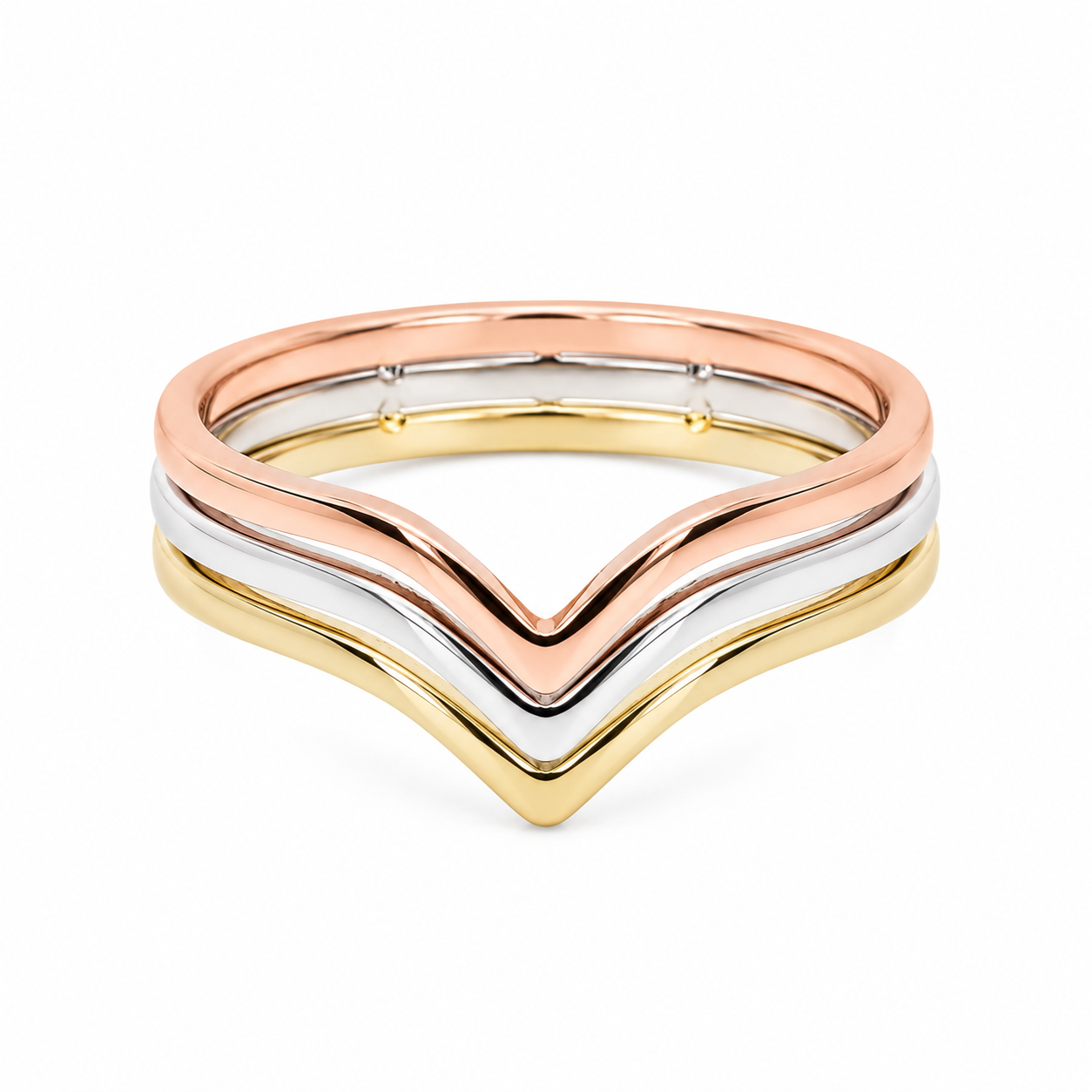 Tri-color ring with gold, rose gold, and white gold chevron bands on a white background