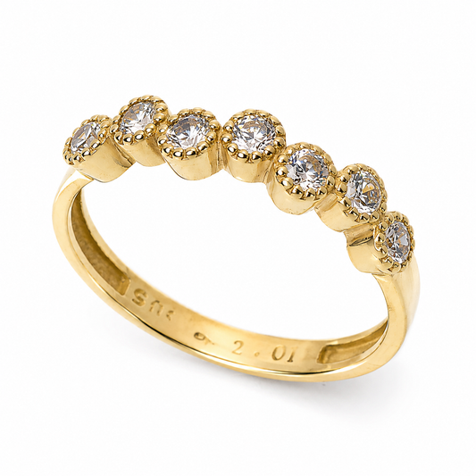 14k gold ring with  7 Cubic Zirconia stones