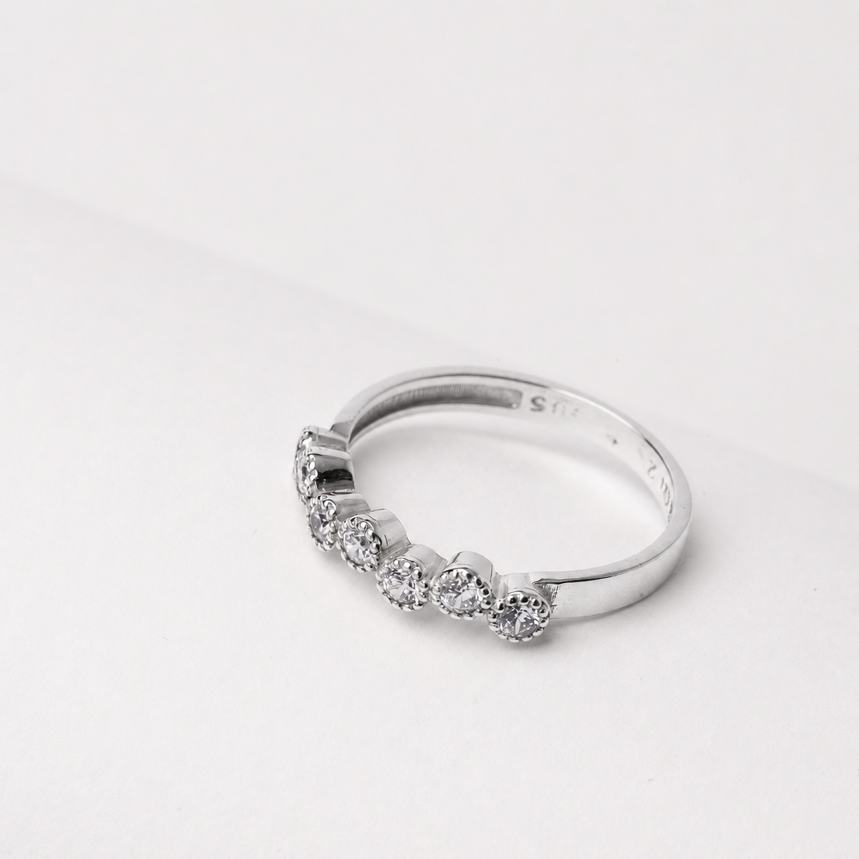14k white gold ring with  7 Cubic Zirconia stones