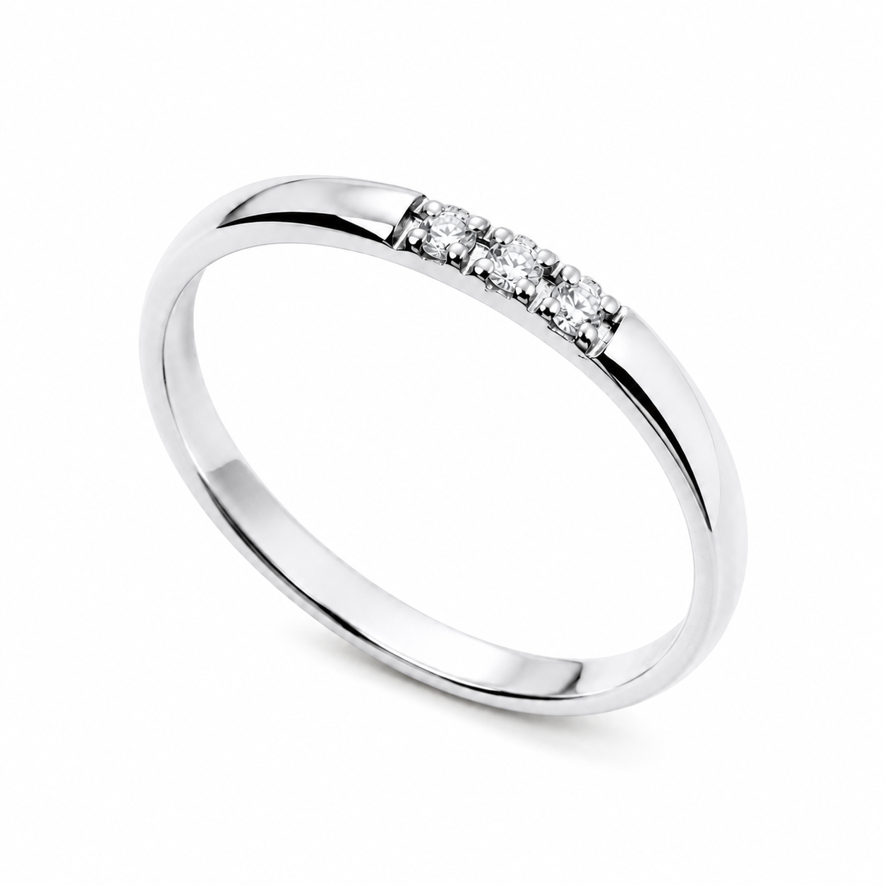 14k white Gold ring with three small diamonds on a white background