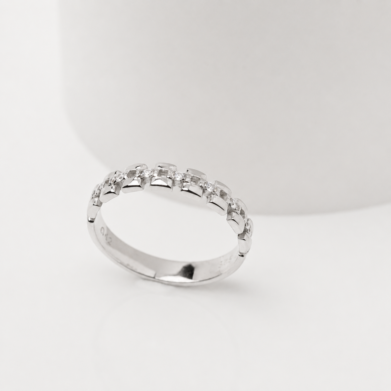 14k white Gold ring with cubic zirconia on a white background