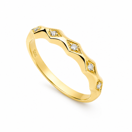 14k Gold ring with cubic zirconia accents on a white background