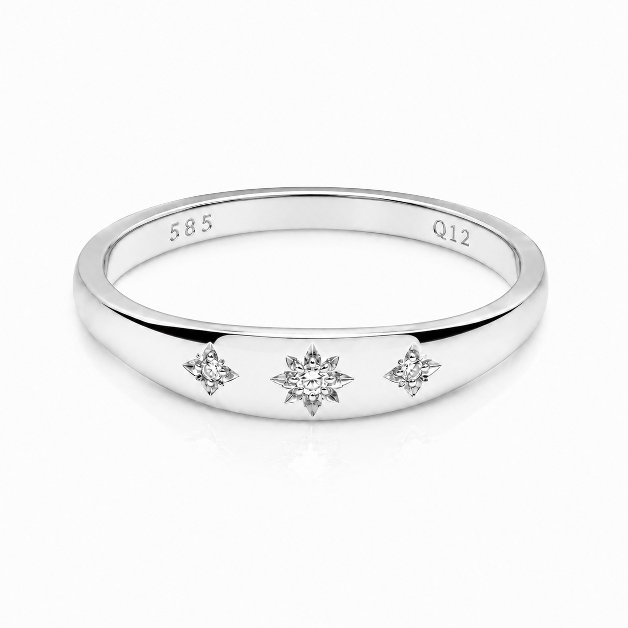 14k white gold ring with three stars and cubic zirconia stones