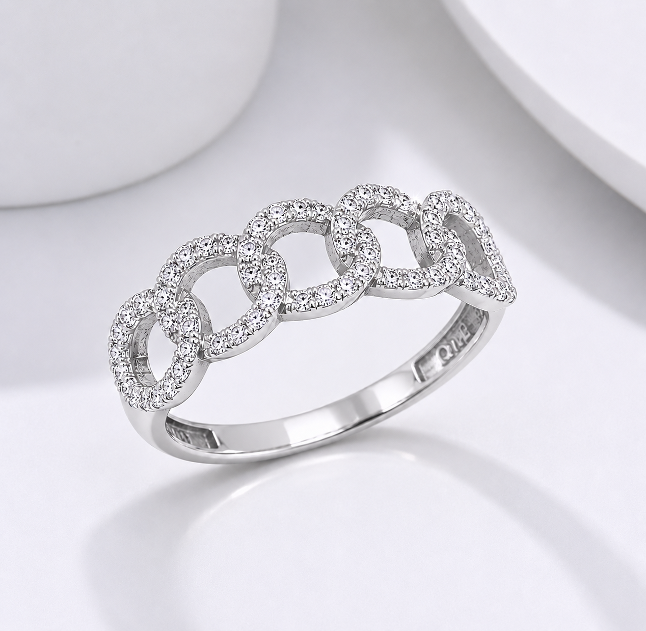 14k white Gold ring with cubic zirconia accents on a white background