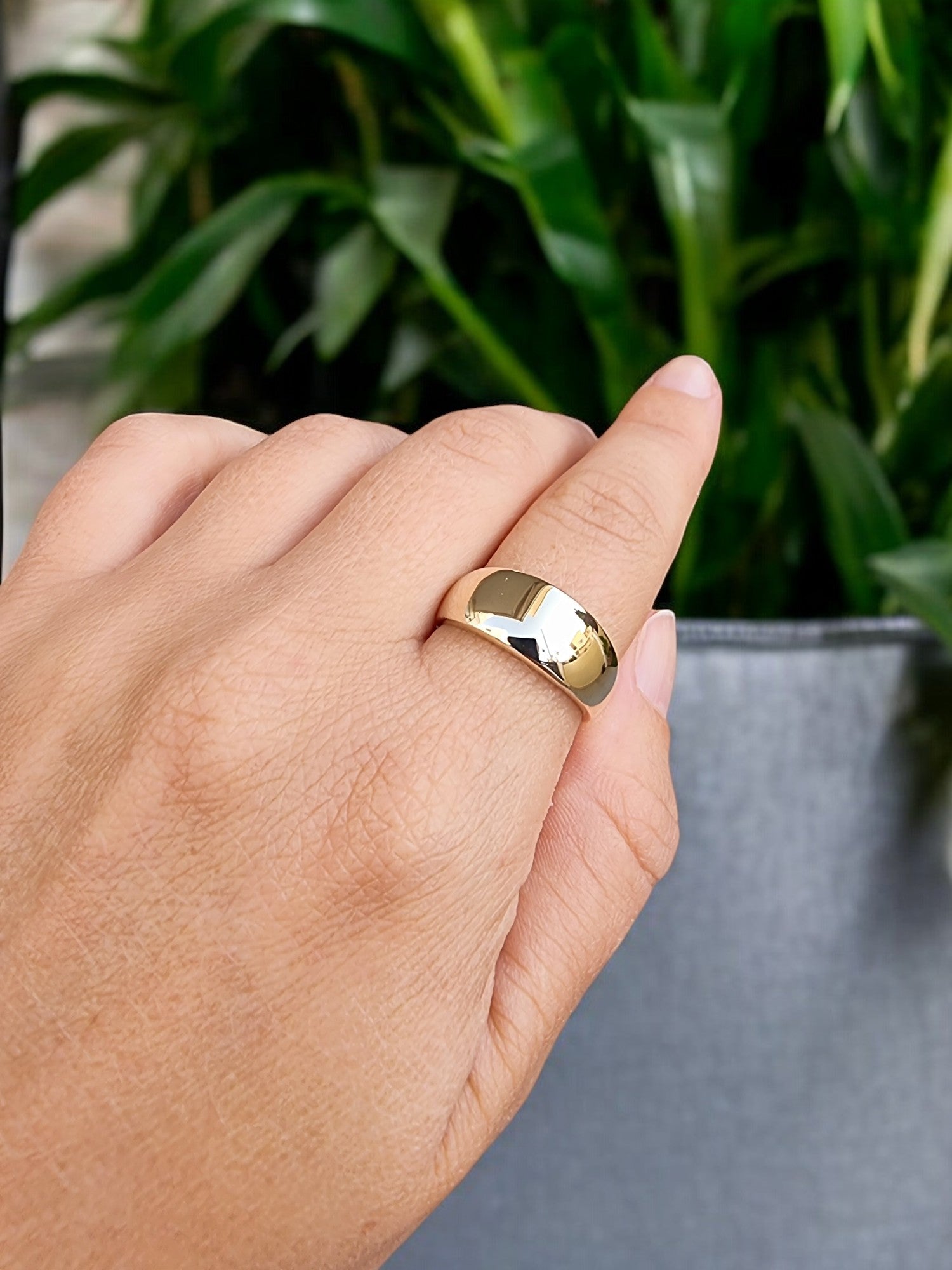 A thick 9mm dome ring crafted in 14k solid gold for women.