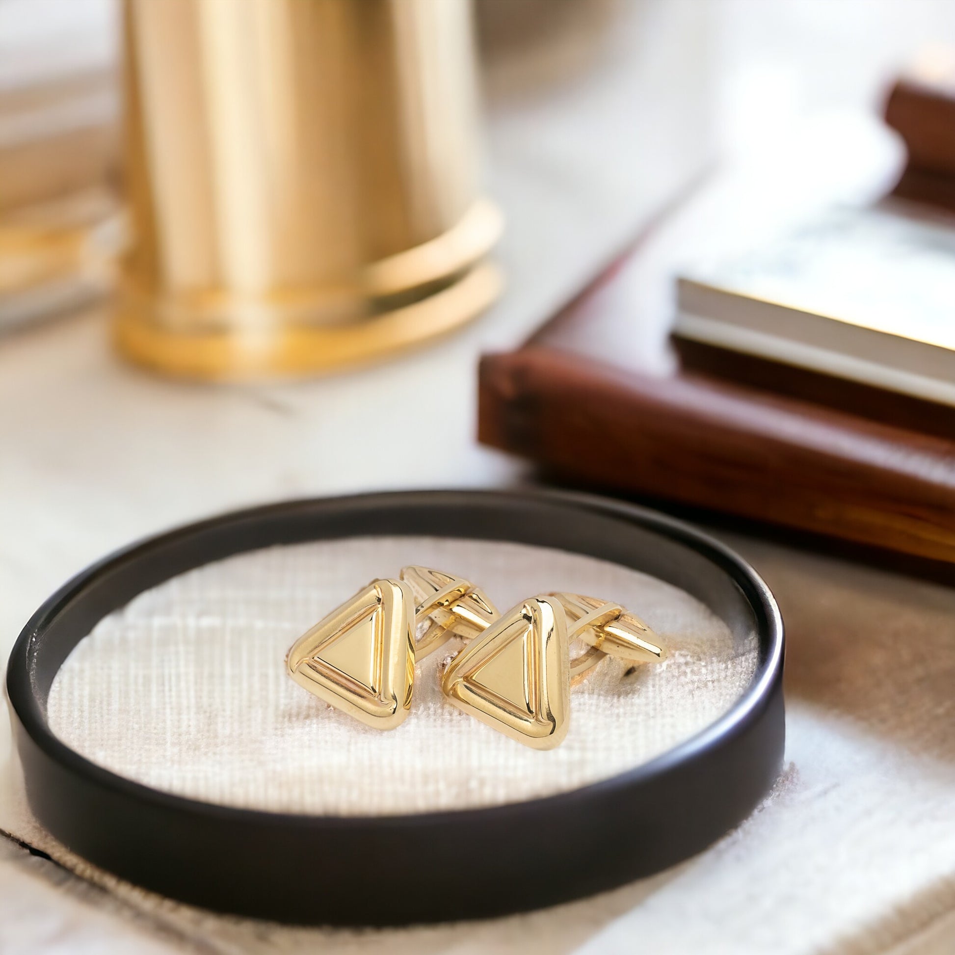 Triangle cufflinks in solid 14K yellow gold.