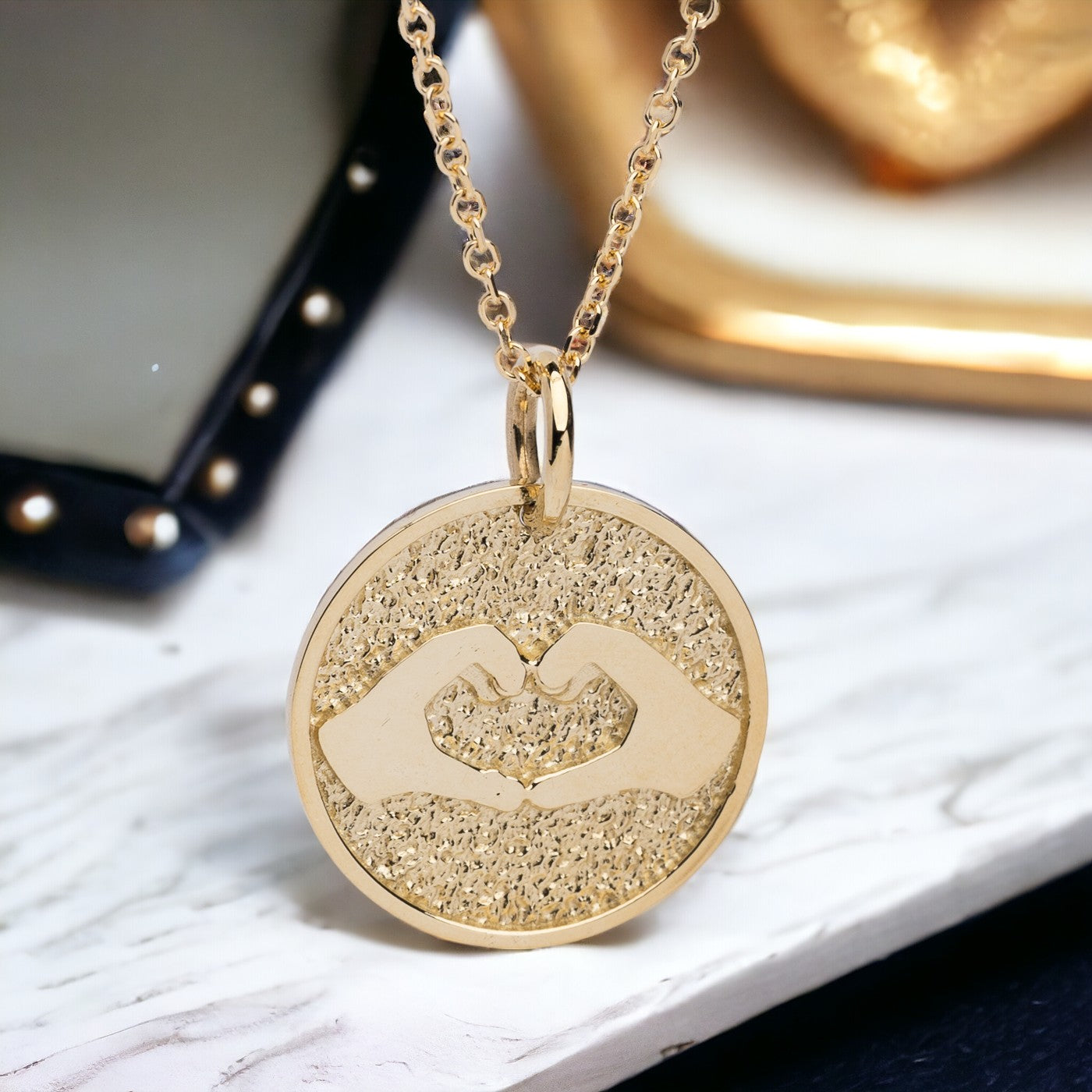 Hand Gesture Heart Necklace in 14k solid gold for women with free engraving on the back side.