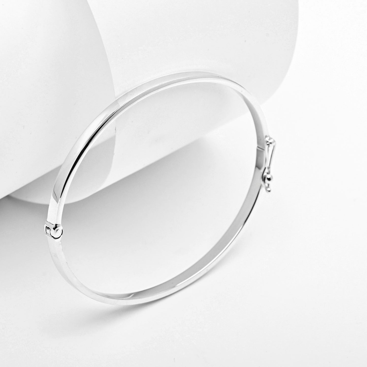 A 3.50mm bangle bracelet crafted in 14k white gold for women.