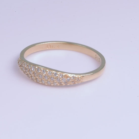 Handcrafted 14k solid gold ring set with white cubic zirconia stones, designed for women.