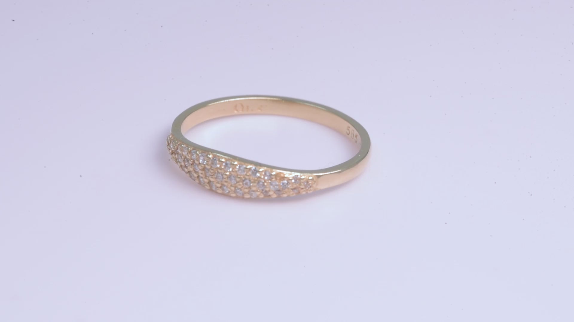 Handcrafted 14k solid gold ring set with white cubic zirconia stones, designed for women.