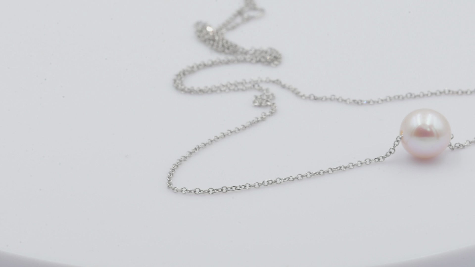 Pearl Necklace Floating in 14k White Gold