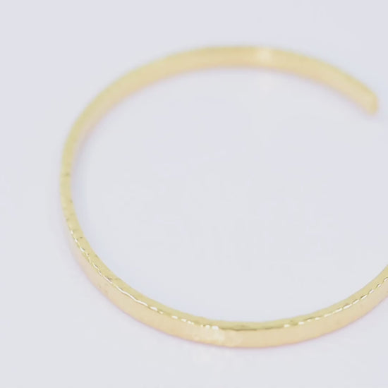 Women's 14k gold hammered bangle bracelet