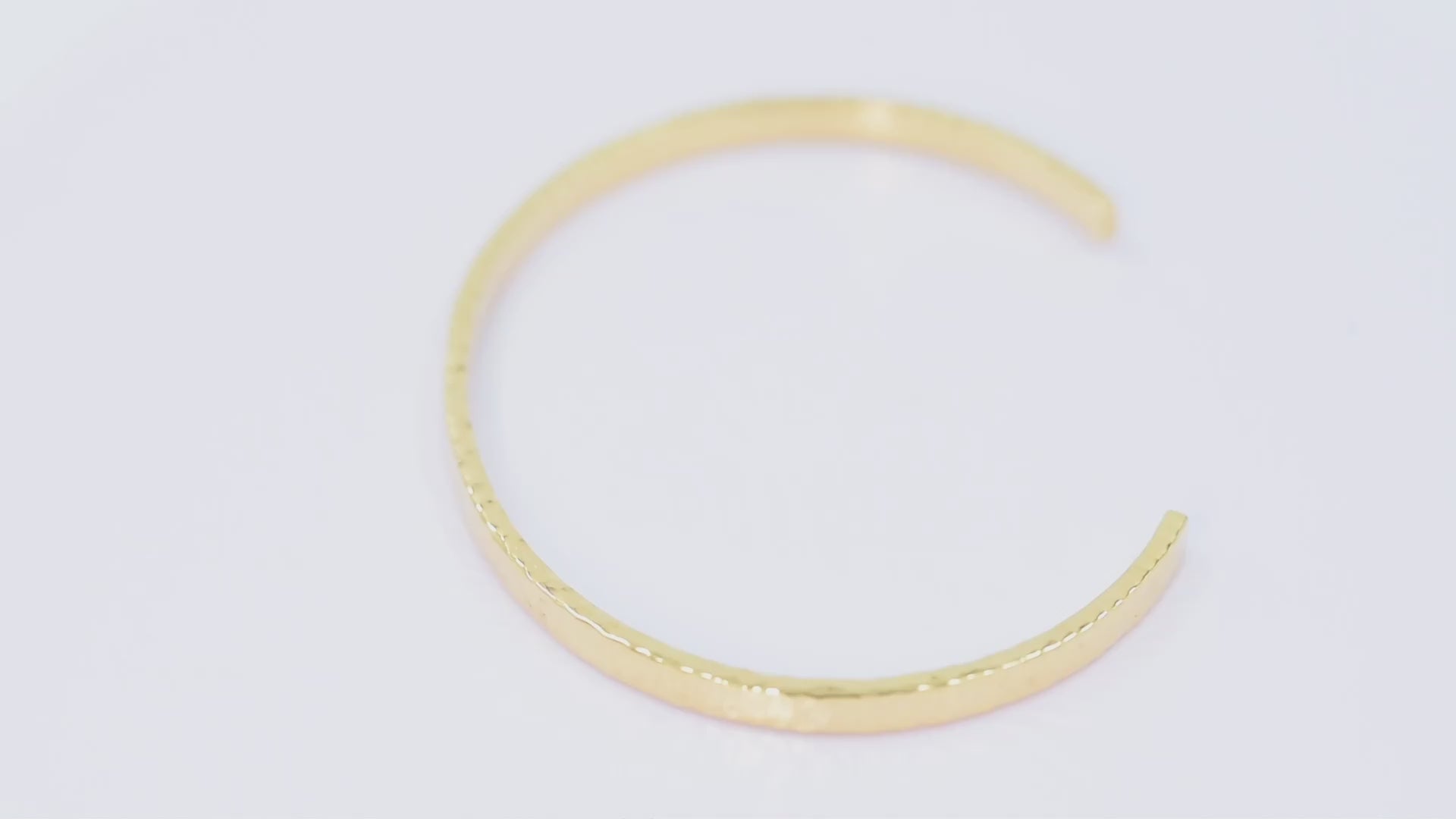 Women's 14k gold hammered bangle bracelet