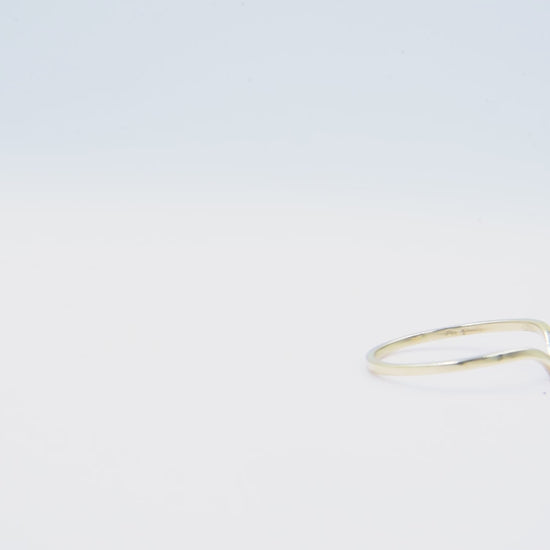 Slim chevron ring in 14k gold for women.