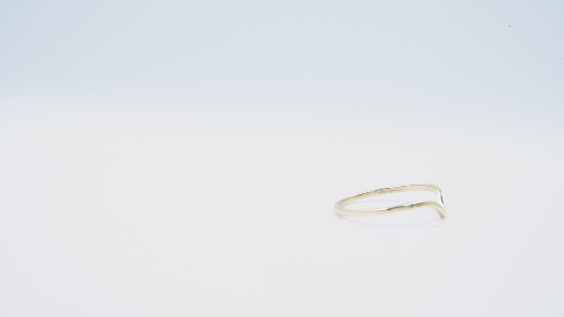 Slim chevron ring in 14k gold for women.