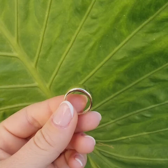 A thick 9mm dome ring crafted in 14k solid gold for women.