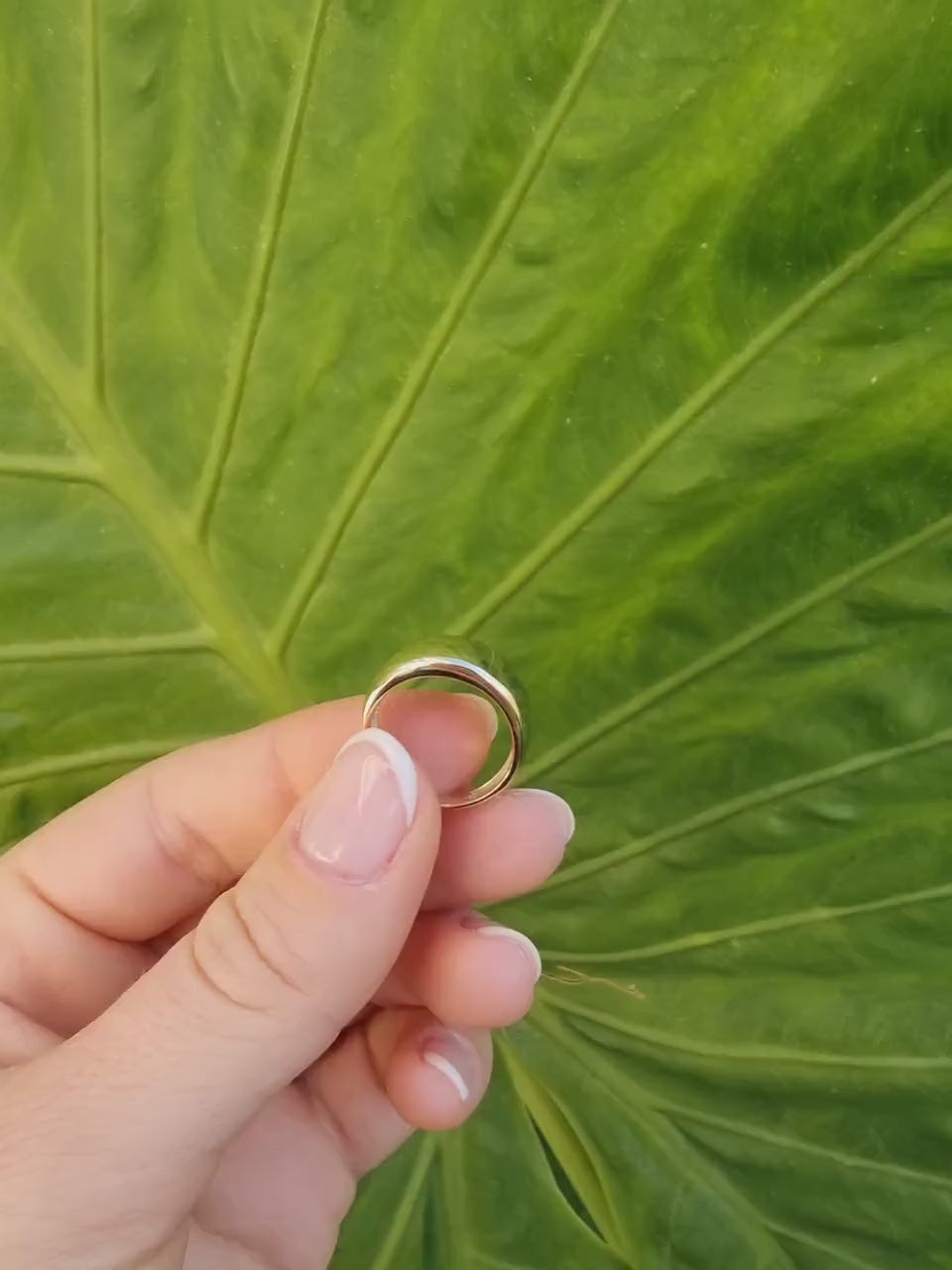 A thick 9mm dome ring crafted in 14k solid gold for women.