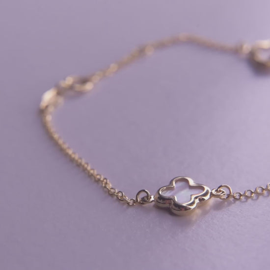 four leaf clover bracelet with 3 charms in 14k gold