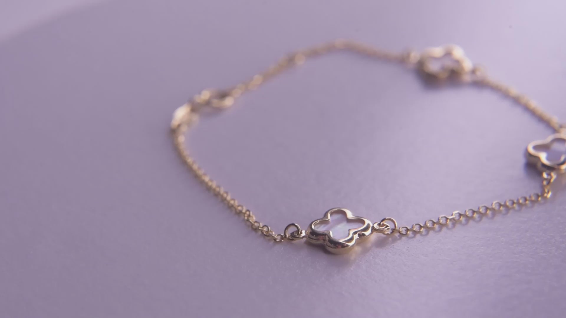 four leaf clover bracelet with 3 charms in 14k gold