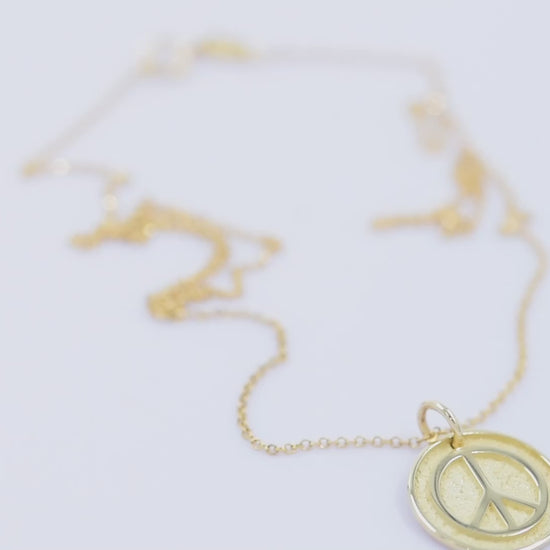 14k Solid Gold Necklace for women, featuring a Peace Symbol with complimentary engraving on the reverse side.