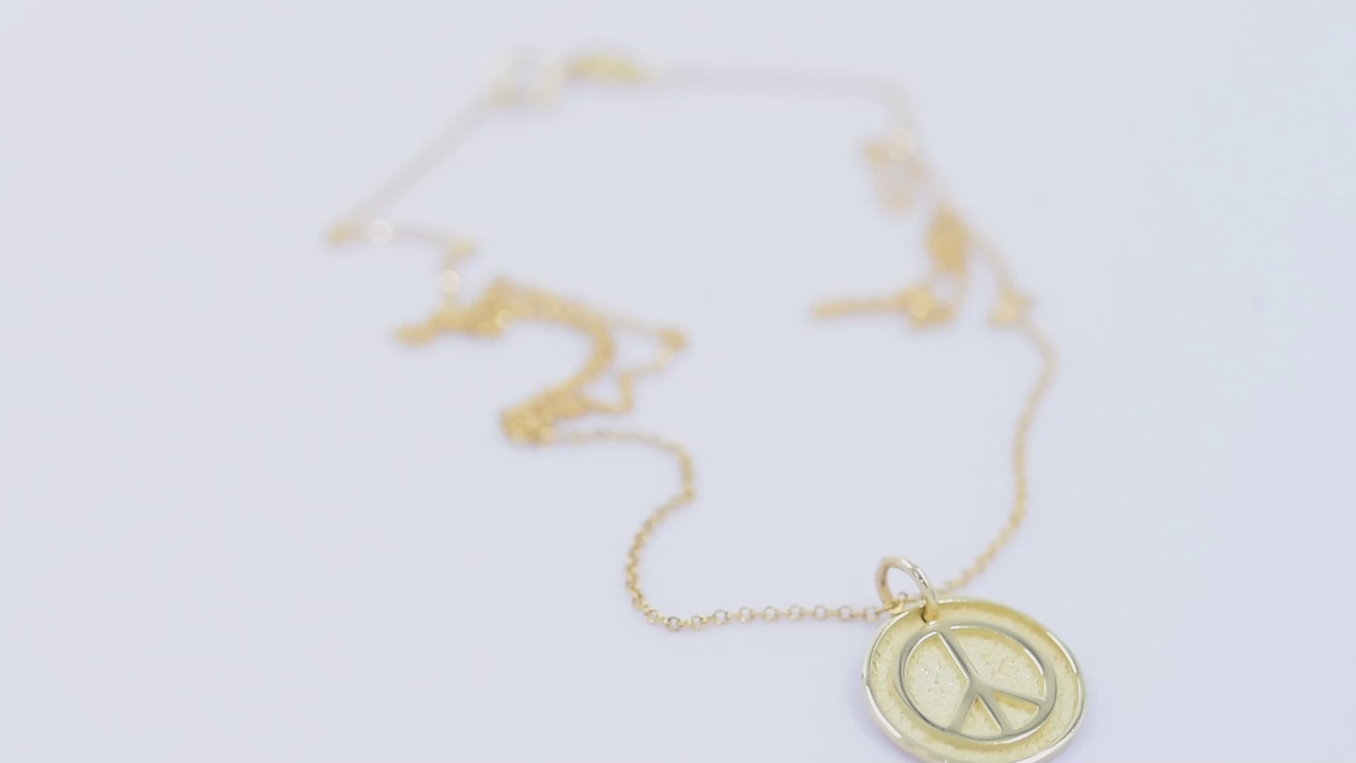 14k Solid Gold Necklace for women, featuring a Peace Symbol with complimentary engraving on the reverse side.