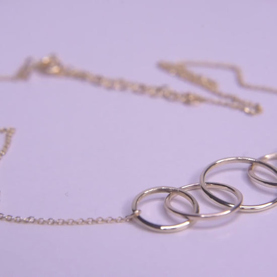 14k gold necklace with five interlocking circles for women