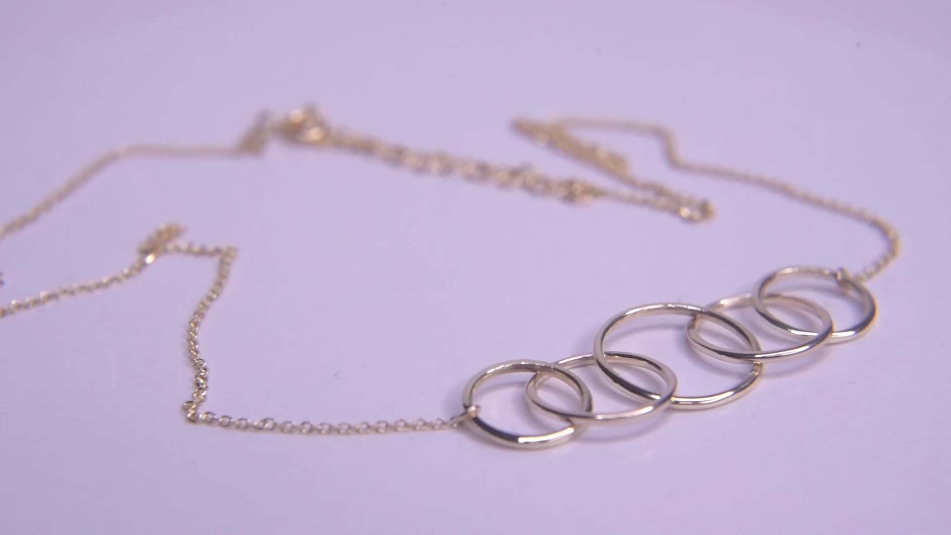 14k gold necklace with five interlocking circles for women