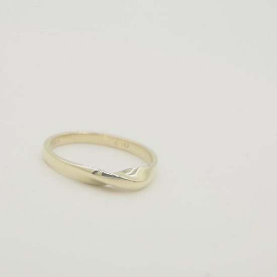 Handmade Möbius ring in 14k solid gold for women.