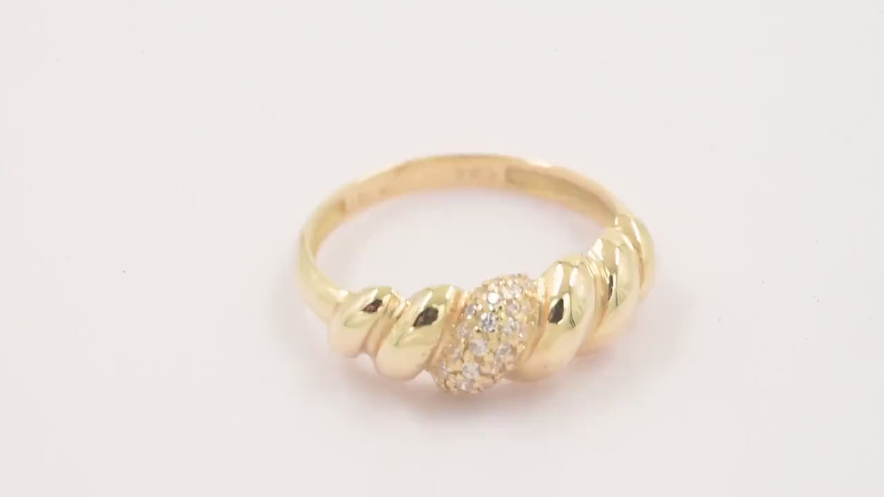 Handmade Croissant Ring in 14k gold, partially paved with white cubic zirconia stones.