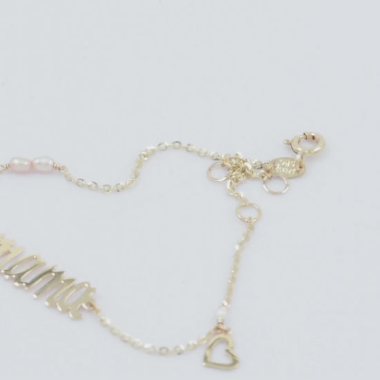 mama 14k gold bracelet with pearls and a small heart