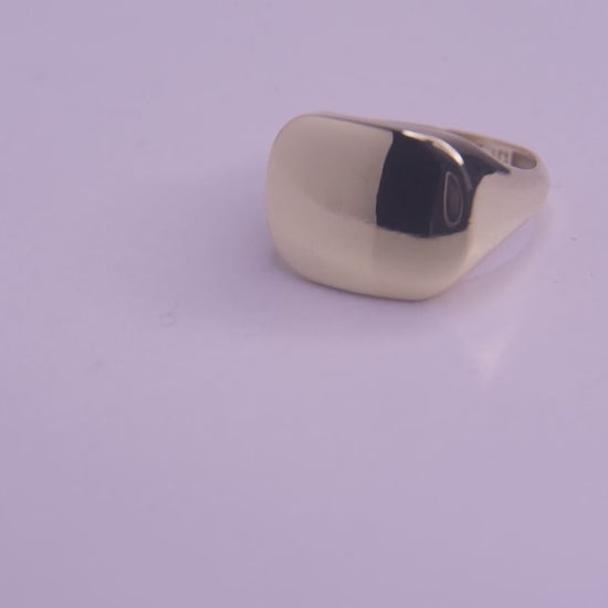 A square signet ring for women, crafted in 14k gold, customizable for a personal touch.