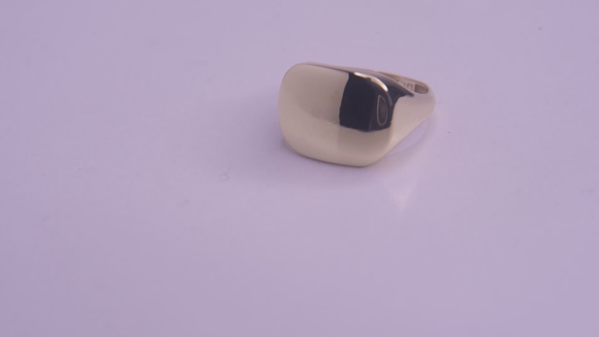 A square signet ring for women, crafted in 14k gold, customizable for a personal touch.