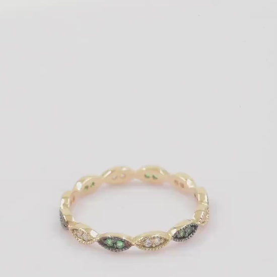 Handmade full eternity ring featuring white and green cubic zirconia stones set in 14k solid gold.