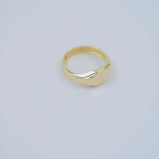 Minimalist Personalized Signet Ring in 14K Gold for women, with the top part being engravable.