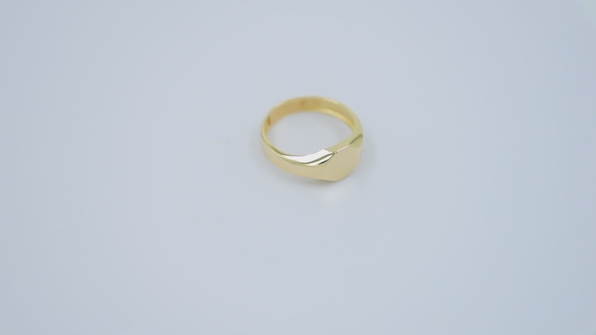 Minimalist Personalized Signet Ring in 14K Gold for women, with the top part being engravable.