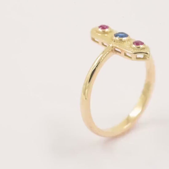 Handcrafted arrow-shaped gold ring with three gemstones set in 14k solid gold.