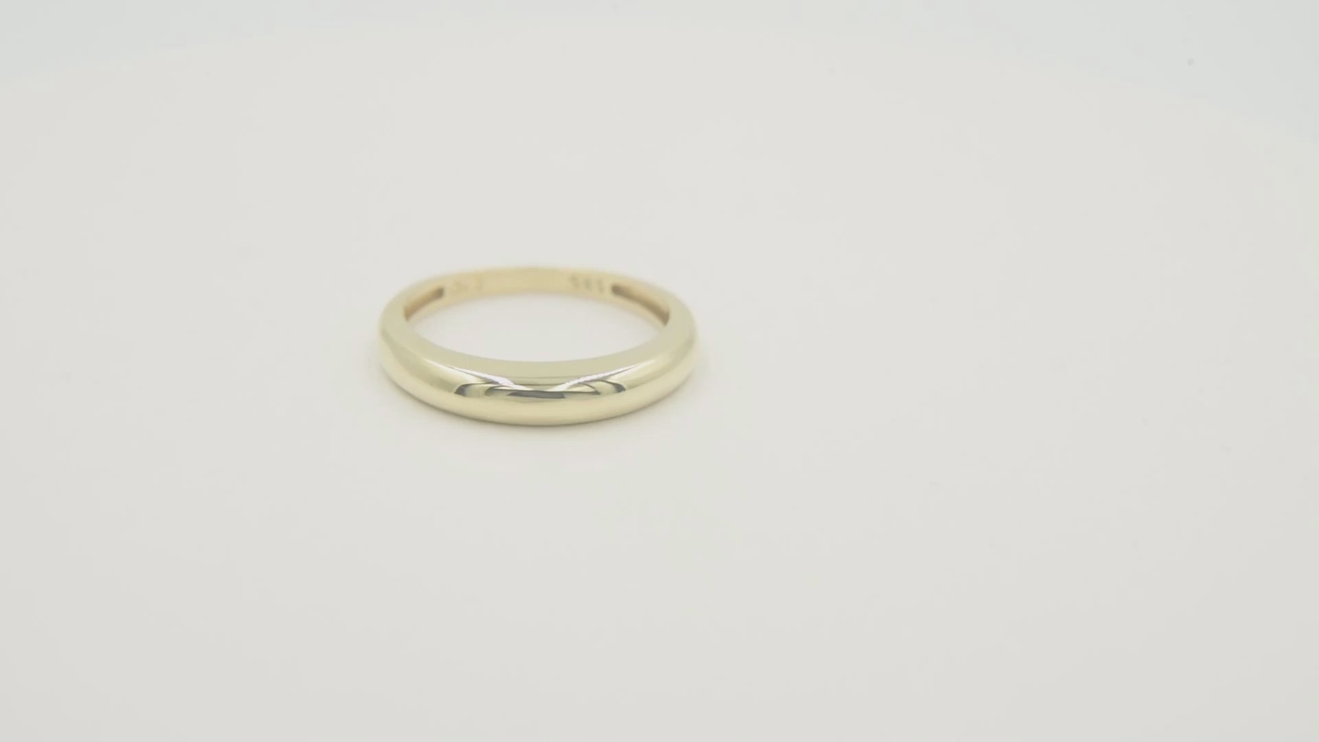 A thin dome ring made of 14k solid gold for women.