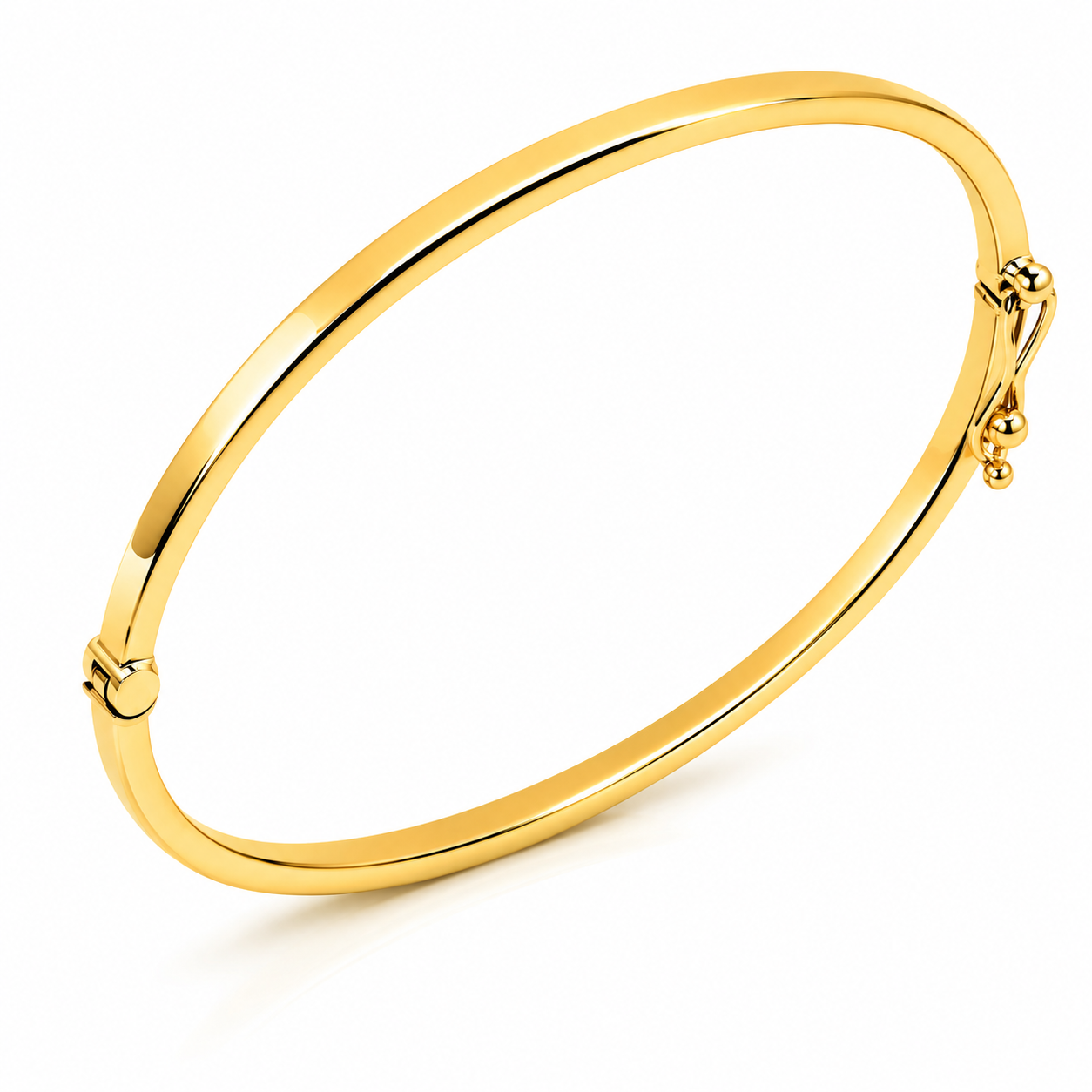 14k yellow gold Gold bangle on a white background