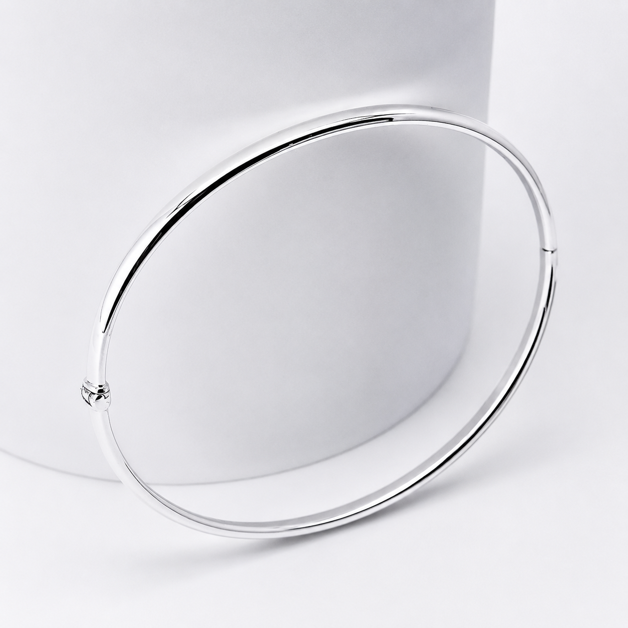 14k white Gold bangle on a white background