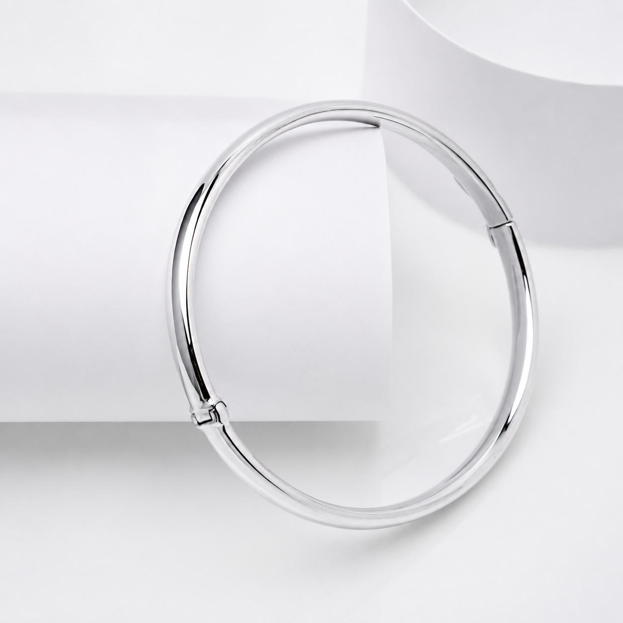 14k white Gold bangle bracelet on a white background